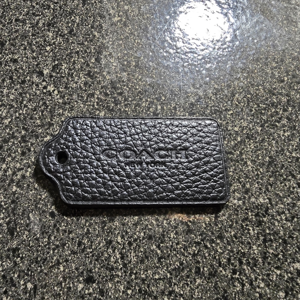 Coach Tag